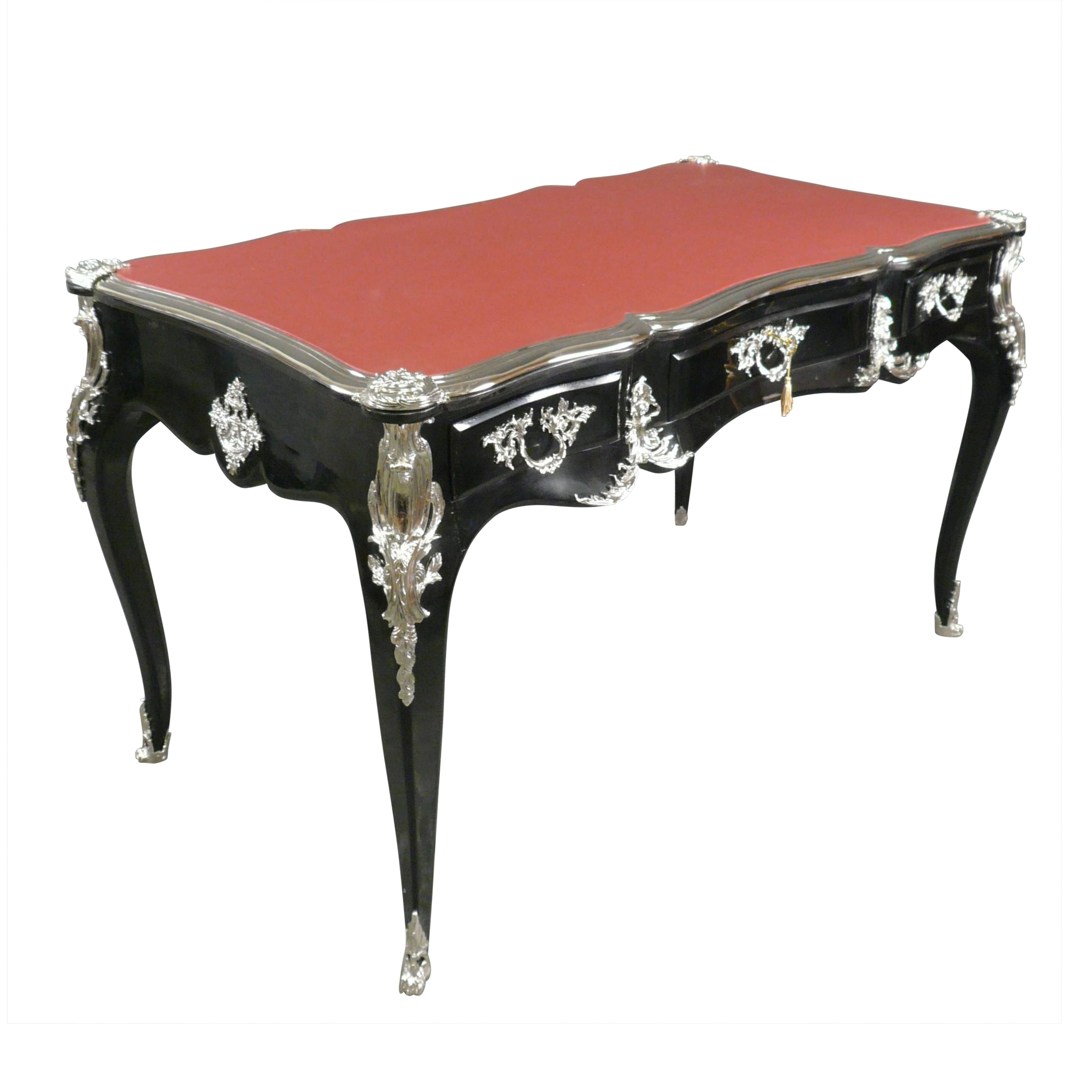 Baroque black desk under red hand